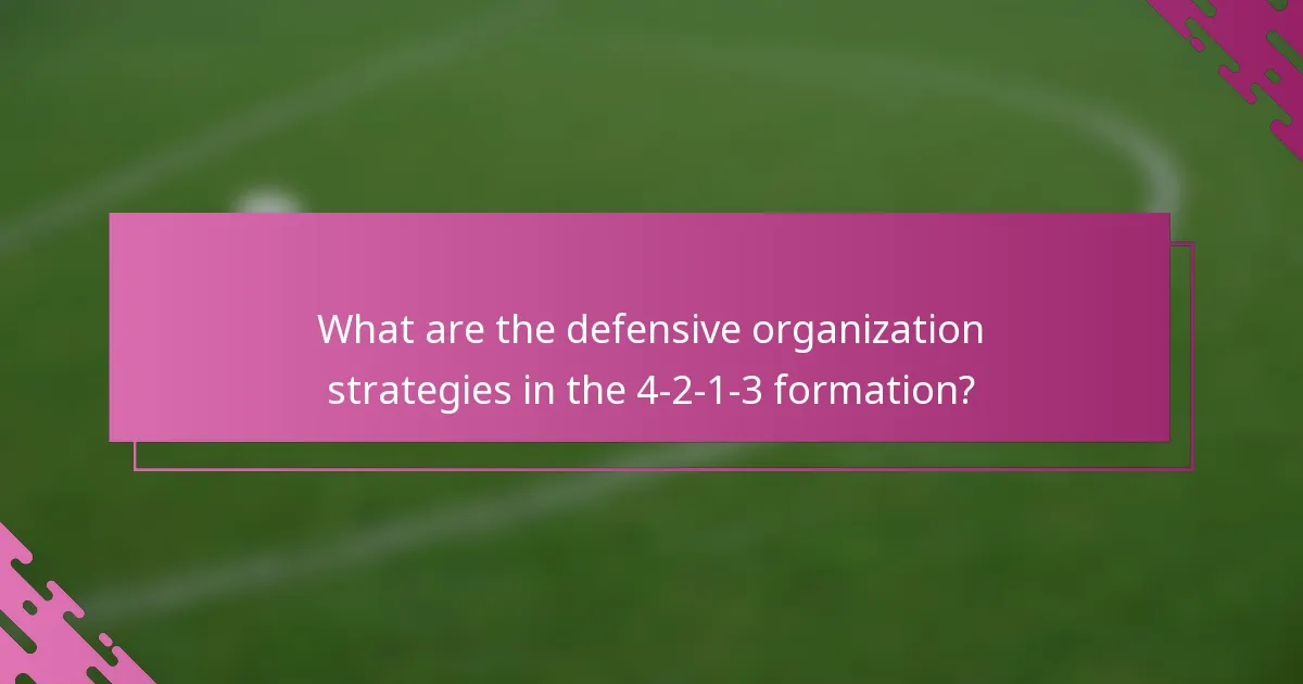 What are the defensive organization strategies in the 4-2-1-3 formation?